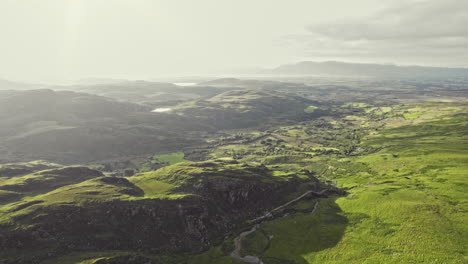 beautiful aerial flying over irish highlands during sunset