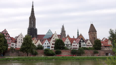 church steeple, row houses in ulm, germany, across danube river