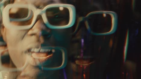 kaleidoscopic effect of black rapper giving hip-hop performance in neon lights