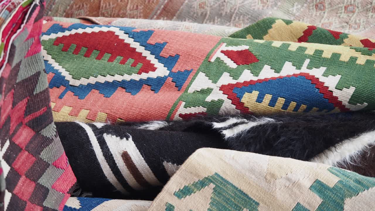 Pile of Colorful Kilim Rugs