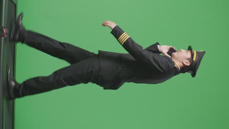 pilot talking on phone on green screen