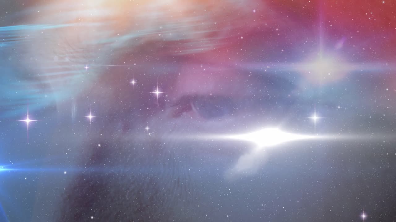 Animation of glowing stars and universe over man's face
