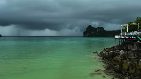 extreme storm rainclouds forming above phi phi island, aerial drone view