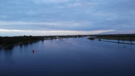 Cargo-Ship-Of-Novalis-Navigates-The-Calm-River-In-Barendrecht-Town-In-Netherlands