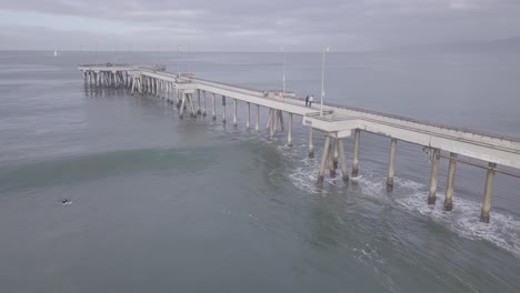 Lone-pink-jogger-on-the-Venice-Pier-in-the-early-morning