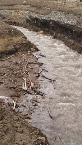 dry creek bed with flowing water