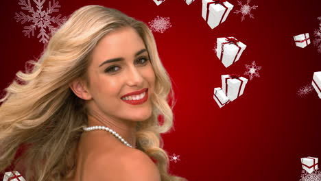 glamorous blonde tossing hair against falling christmas gifts