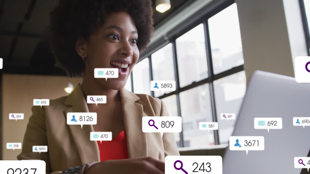 Animation of media icons over african american businesswoman in office