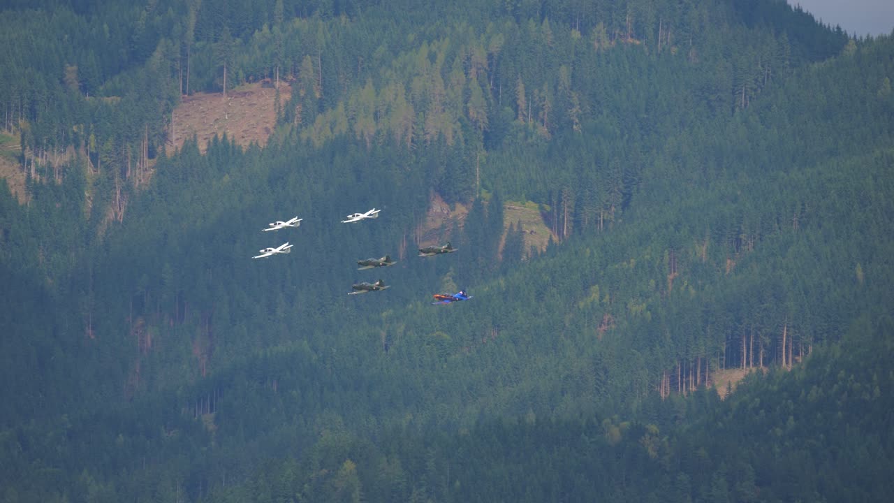Various aerobatic pilots from different squadrons fly in beautiful formation at the air show called Airpower