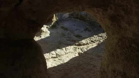 ancient cave interior, rock formation, historical site