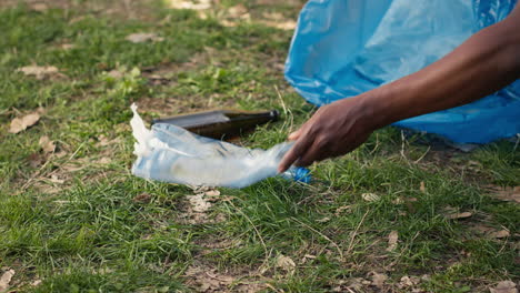 people supporting cleanup of the natural environment by grabbing recyclables