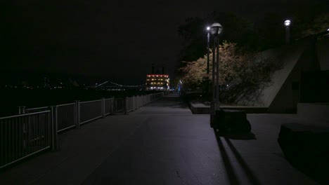 Detroit,-Michigan-riverwalk-at-night-with-gimbal-video-walking-forward