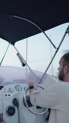 man driving a boat