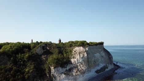 white cliffs, in germany on the rugged island with a light house on top