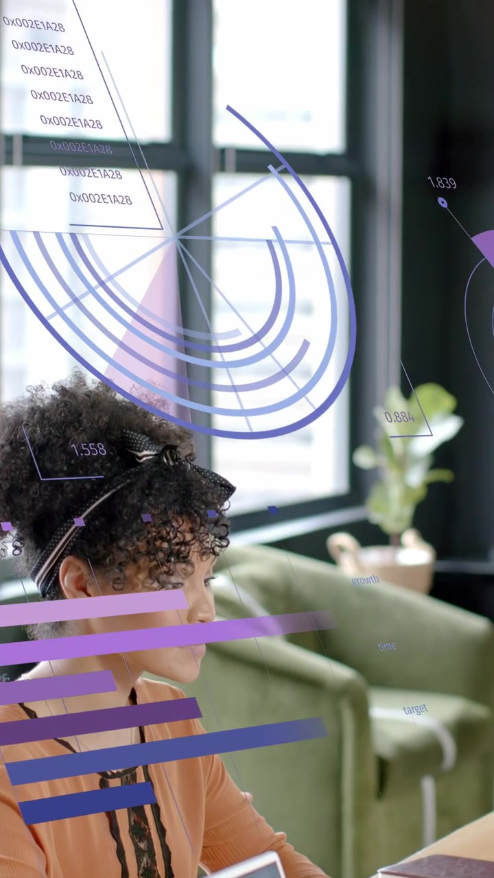 Vertical video: Woman typing, launching floating charts and rings, checking business data