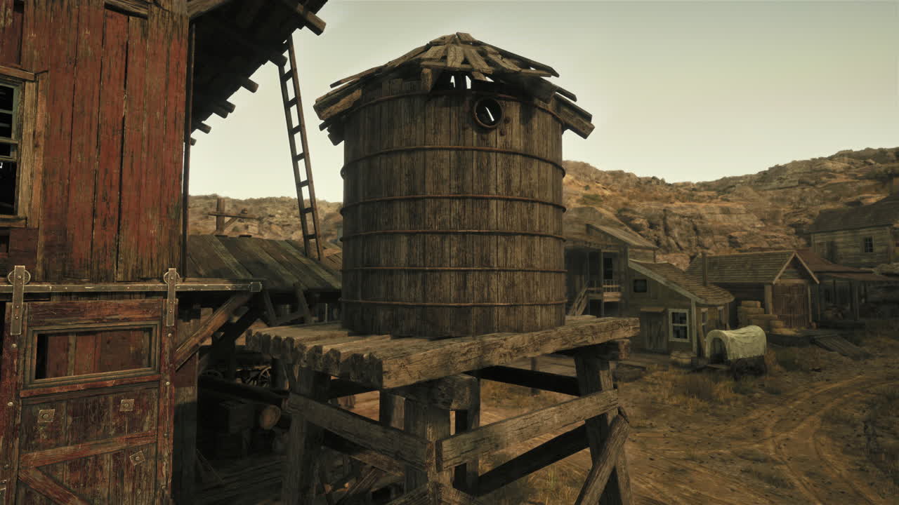 ciudad vieja occidental con torre de agua de madera