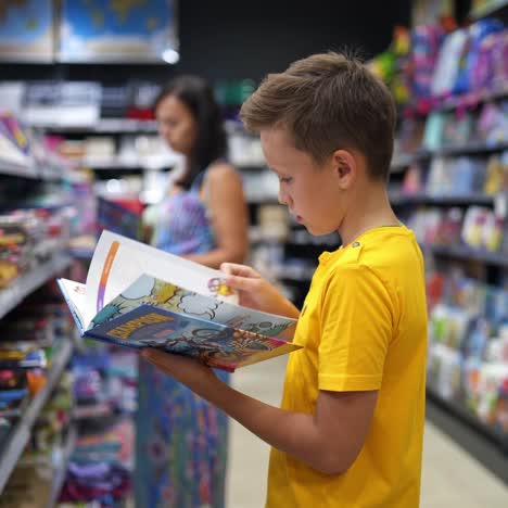 boy choosing school stationery