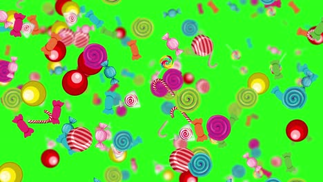 vibrant candies falling against a green background