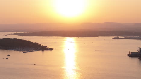 Golden sunset aerial view over Oslofjord and Hovedoya from Ekebergparken, Oslo