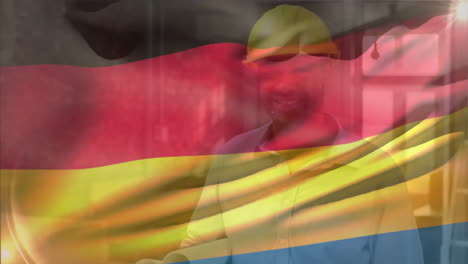 animación de la bandera alemana ondeando, ingeniero biracial con casco caminando con planos