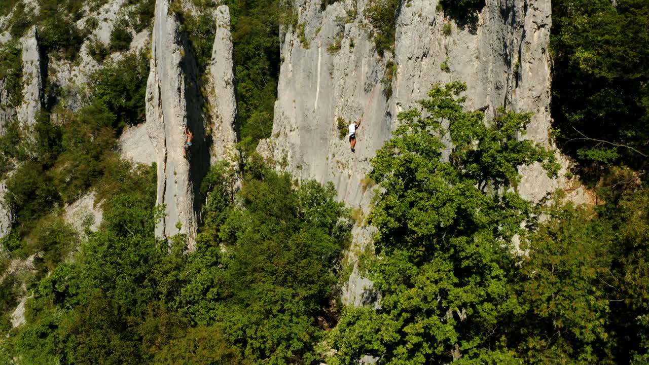 Aerial View Of Active And Strong Rock Climbers Climbing At Famous Vela Draga Canyon In Vranja, Croatia