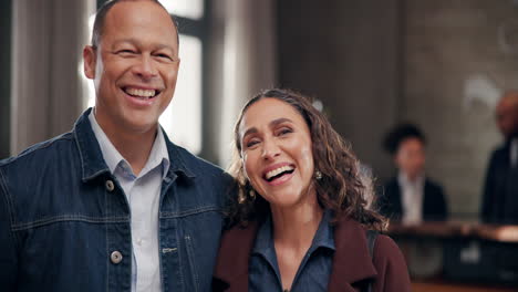 a happy couple smiling indoors