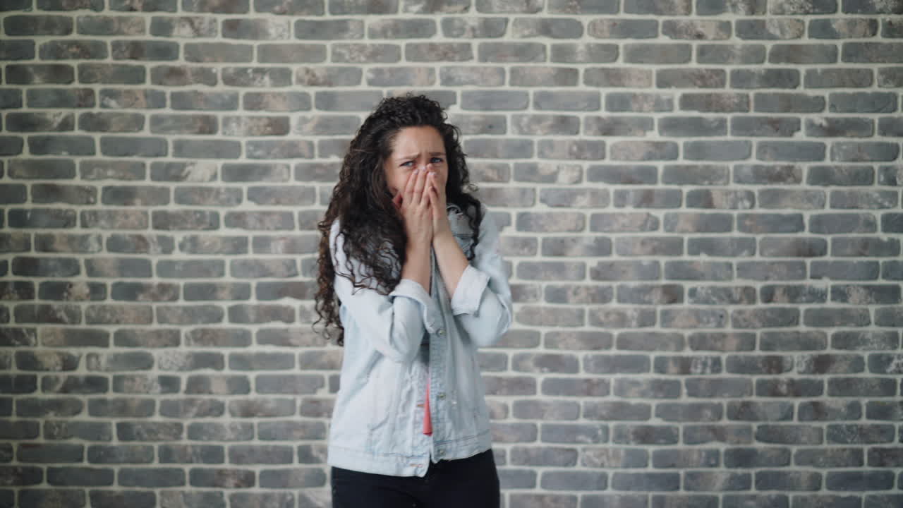 Woman looking distressed and scared
