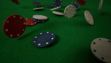 casino chips falling towards camera