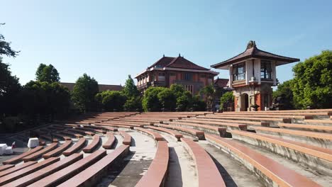 outdoor stage in isi denpasar art university cultural building grandstands bali indonesia clear summer skyline