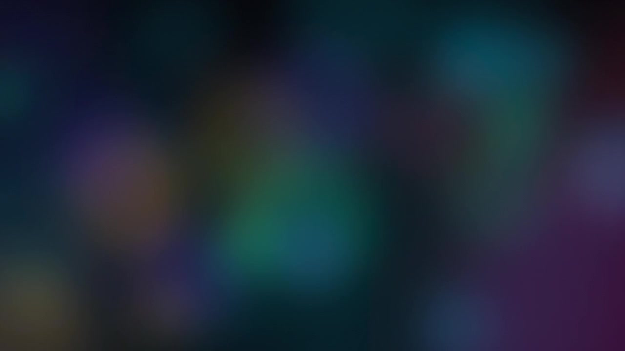 Abstract Background with Soft Glowing Blue and Purple Bokeh Lights