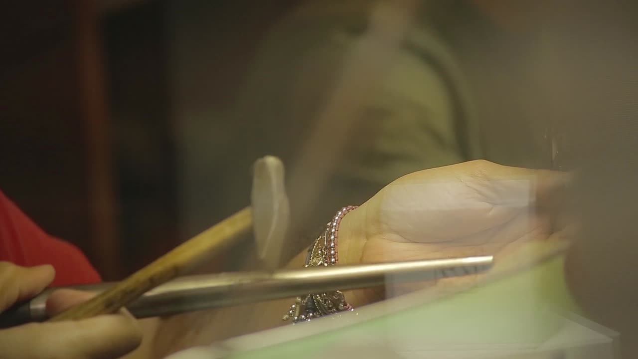 Italian Goldsmith at work building an engagement or a wedding ring