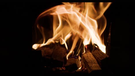 Traditional-Japanese-fire-oven-with-logs-burning-and-hot-dancing-flames