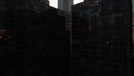 revealing-chicago-behind-two-tall-black-buildings