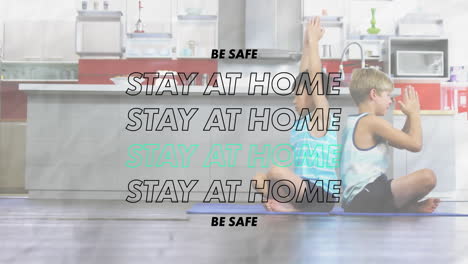 animation of words be safe stay at home flashing over two boys practising yoga