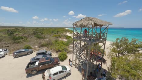 FPV-drone-view-at-popular-touristic-Bahia-de-Las-Aguilas,-Caribbean