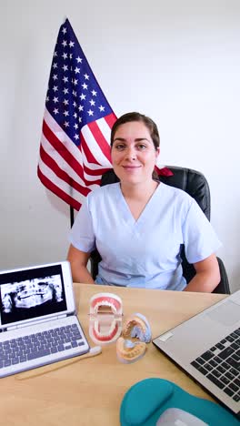 female dentist and usa national flag background. labor day concept.