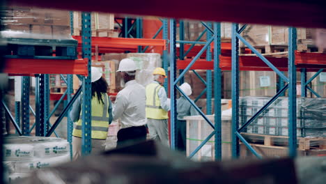 warehouse workers inspecting inventory