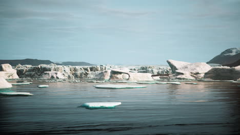 Blue-icebergs-of-Antarctica-with-frozen-and-snow-covered-Antarctic-scenery