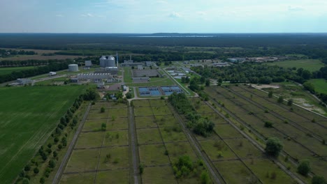 Wastewater treatment plant aerial view, demonstrating water purification process, ensuring environmental sustainability and resource management. Wonderful aerial view flight wide orbit overview drone
