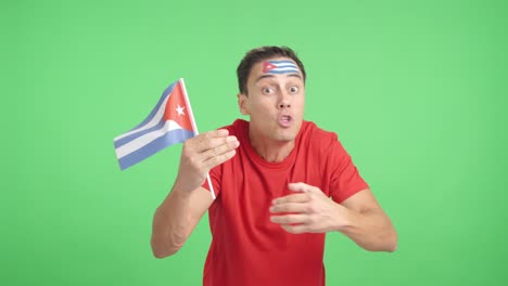man cheering for cuba, angry with the decision of referee