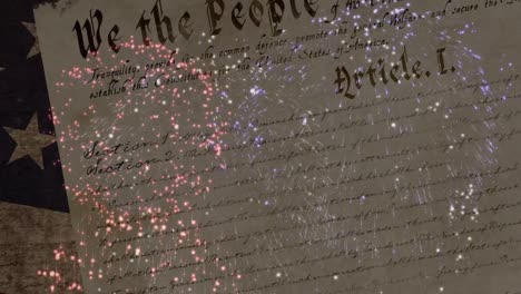 Animation-of-fireworks-over-constitution-text-and-flag-of-united-states-of-america