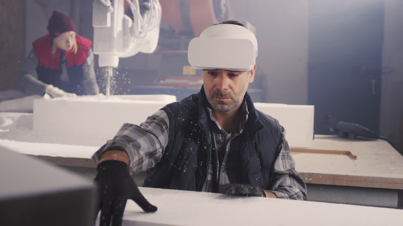 Industrial Worker Using VR Headset in a Manufacturing Facility