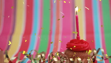 animación de confeti cayendo sobre la vela en el pastel de cumpleaños.