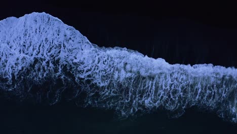 Top-down-View-Of-Atlantic-Waves-On-Black-Sand-Beach