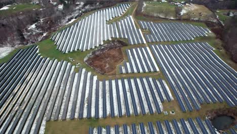 solar panel field near quechee, vermont - aerial flyover