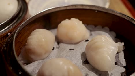 close-up of dim sum shrimp dumplings steaming