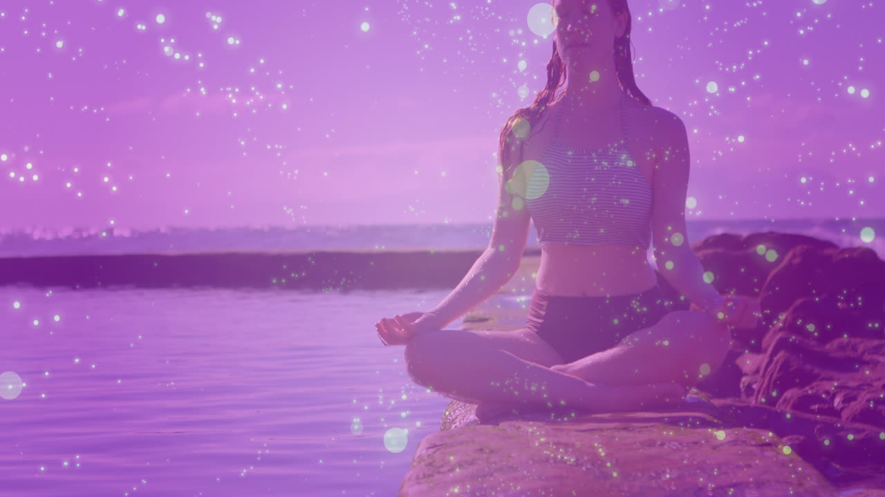 animación de luces y conexiones sobre mujer caucásica practicando yoga en la playa