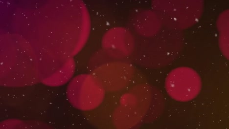 animation of christmas snow falling with red spots on black background