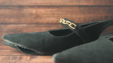 worn black suede heels