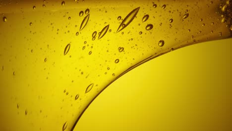 golden liquid texture with bubbles